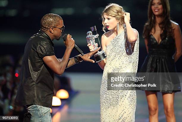 Kanye West jumps onstage after Taylor Swift won the "Best Female Video" award during the 2009 MTV Video Music Awards at Radio City Music Hall on...