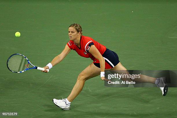 Kim Clijsters of Belgium returns a shot to Caroline Wozniacki of Denmark during the Women�s Singles final on day fourteen of the 2009 U.S. Open at...