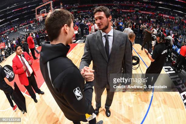Juan Hernangomez of the Denver Nuggets shakes hands with Danilo Gallinari of the LA Clippers after the game on January 17, 2018 at STAPLES Center in...