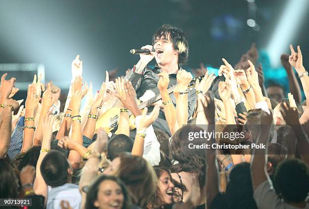 Billie Joe Armstrong of Green Day performs in the audience during the 2009 MTV Video Music Awards at Radio City Music Hall on September 13, 2009 in...