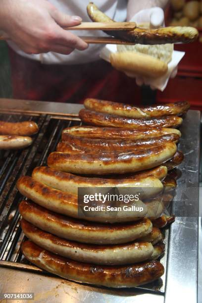 Freshly-grilled bratwurst sausages await visitors at the 2018 International Green Week agricultural trade fair on January 19, 2018 in Berlin,...
