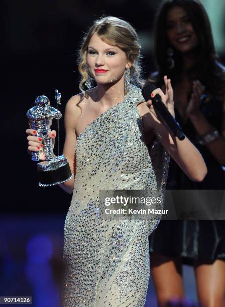 Singer Taylor Swift reacts after Kanye West jumped onstage during the 2009 MTV Video Music Awards at Radio City Music Hall on September 13, 2009 in...
