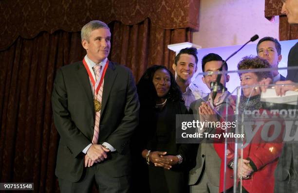 Commissioner Jay Monahan wears the Business Ambassador Award presented to him by Govenor Rick Scott during the PGA TOUR Global Home press conference...