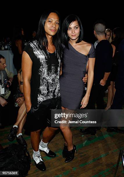 Leigh Lezark of The MisShapes poses with designer Zaldy backstage before the Y-3 Spring 2010 Fashion Show at the Park Avenue Armory on September 13,...