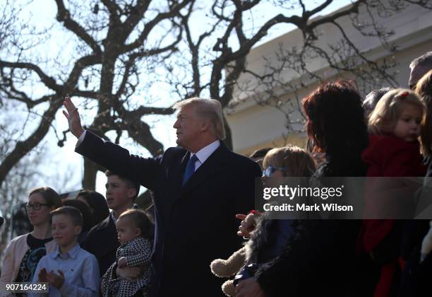 President Donald Trump waves after speaking to March for Life participants and pro-life leaders in the Rose Garden at the White House on January 19,...