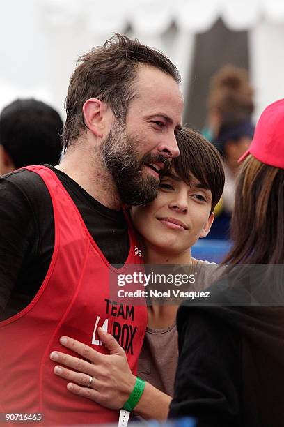 Jason Lee and Ceren Alkac attend the 23rd Annual Nautica Malibu Triathalon at Zuma Beach on September 13, 2009 in Malibu, California.