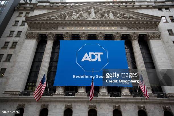Inc. Signage is displayed during the company's initial public offering at the New York Stock Exchange in New York, U.S., on Friday, Jan. 19, 2018....