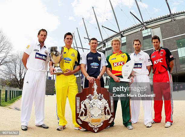 Chris Simpson of Qld, Marcus North of WA, David Hussey of VIC, George Bailey of TAS, Simon Katich of NSW and Graham Manou of SA model the new seasons...