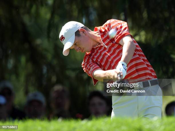 Stiggy Hodgson of England and the Great Britain and Ireland Team tees off at the 4th hole against Peter Uihlein of the USA during the final afternoon...