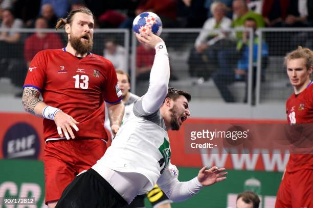 Germany's Jannik Kohlbacher shoots on goal during the group II match of the Men's 2018 EHF European Handball Championship between Germany and Czech...