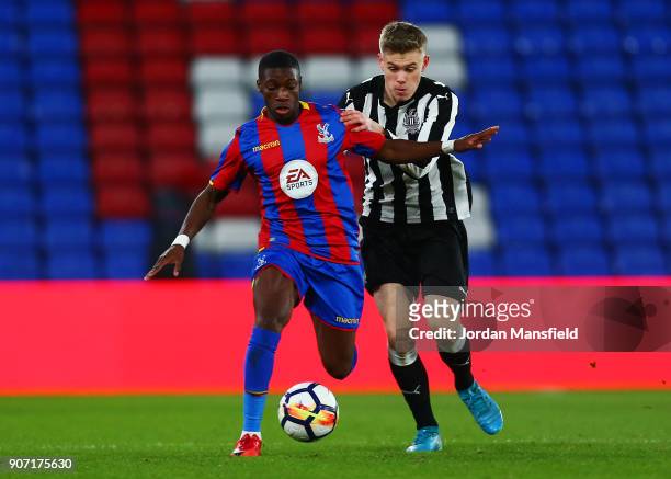 Joseph Hungbo of Crystal Palace avoids a challenge from Matty Longstaff of Newcastle during the FA Youth Cup Fourth Round match between Crystal...