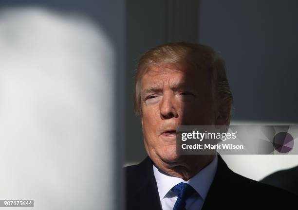 President Donald Trump stands in the colonnade as he is introduced to speak to March for Life participants and pro-life leaders in the Rose Garden at...