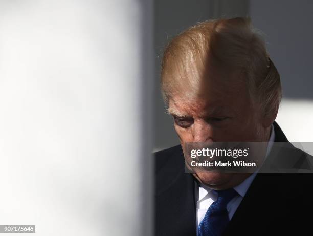 President Donald Trump stands in the colonnade as he is introduced to speak to March for Life participants and pro-life leaders in the Rose Garden at...