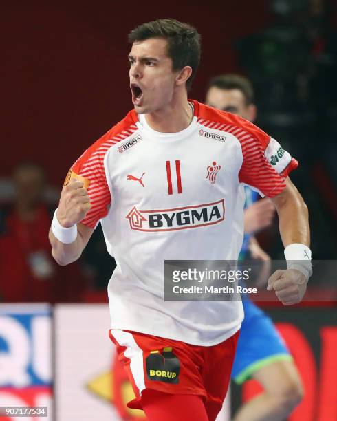 Rasmus Lauge Schmidt of Denmark celebrates a goal during the Men's Handball European Championship main round group 2 match between Slovenia and...
