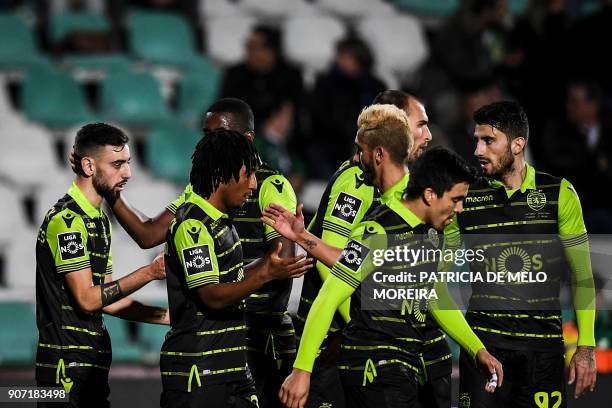 Sporting's midfielder Bruno Fernandes celebrates a goal with teammates during the Portuguese league football match between Vitoria FC and Sporting CP...