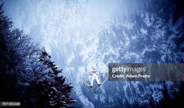 Junshiro Kobayashi of Japan soars through the air during his first competition jump of the Ski Flying World Championships on January 19, 2018 in...