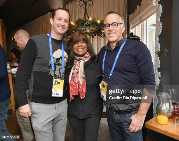 Director of Programming at Sundance Film Festival, Trevor Groth, Attorney Chaz Ebert, and Director of Sundance Film Festival, John Cooper, attend the...