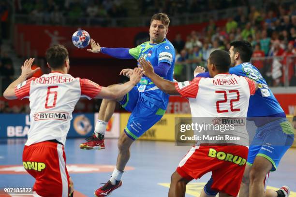 Marko Bezjak of Slovenia passes the ball during the Men's Handball European Championship main round group 2 match between Slovenia and Denmark at...