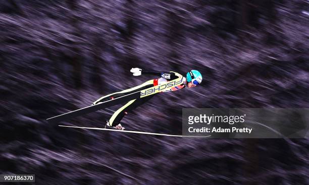 Michael Hayboeck of Austria soars through the air during his first competition jump of the Ski Flying World Championships on January 19, 2018 in...