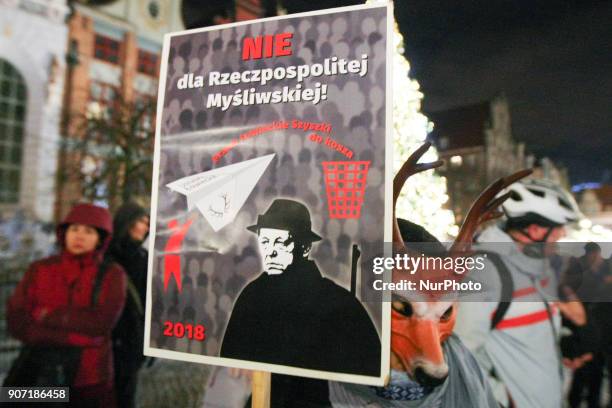 Protesters holding banners, with anti-hunting slogans are seen in Gdansk, Poland on 19 January 2018 Over 200 people protested against new hunting law...