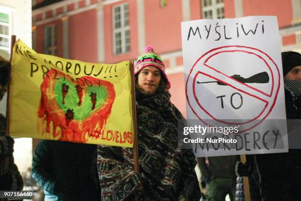 Protesters holding banner that speak &quot; Hunters are murderers &quot; are seen in Gdansk, Poland on 19 January 2018 Over 200 people protested...