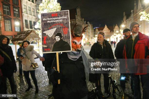 Protesters holding banners, with anti-hunting slogans are seen in Gdansk, Poland on 19 January 2018 Over 200 people protested against new hunting law...