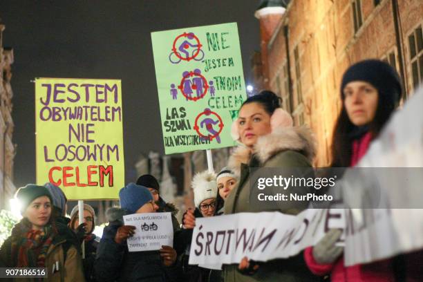 Protesters holding banners, with anti-hunting slogans are seen in Gdansk, Poland on 19 January 2018 Over 200 people protested against new hunting law...