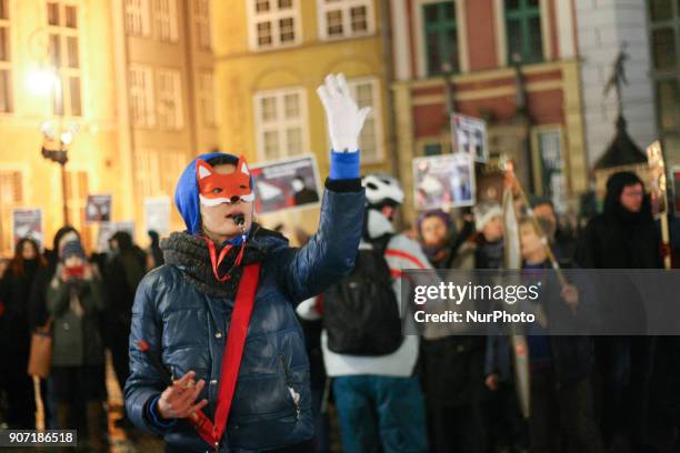 Protesters holding banners, with anti-hunting slogans are seen in Gdansk, Poland on 19 January 2018 Over 200 people protested against new hunting law...