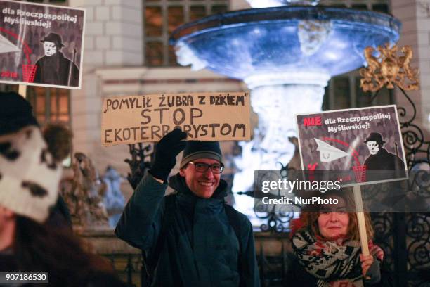 Protesters holding banners, with anti-hunting slogans are seen in Gdansk, Poland on 19 January 2018 Over 200 people protested against new hunting law...
