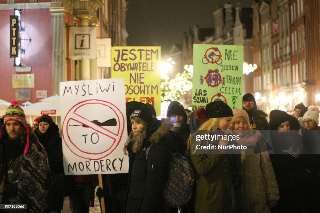 Hunters Arguing Protesters holding banner that speak