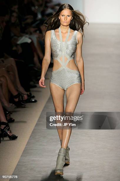 Model walks the runway wearing Herve Leger By Max Azria Spring 2010 during Mercedes-Benz Fashion Week at Bryant Park on September 13, 2009 in New...