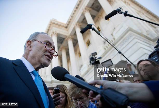 Senate Minority Leader Chuck Schumer speaks briefly with reporters after returning to the U.S. Capitol after meeting with U.S. President Donald Trump...