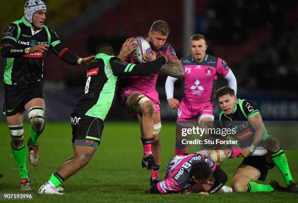 Ross Moriarty of Gloucester runs through the Paloise defence during the European Rugby Challenge Cup match between Gloucester and Section Paloise at...