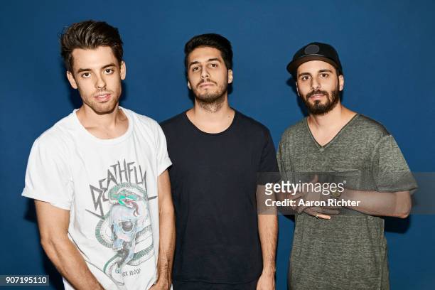 Samuel Frisch, Alex Makhlouf and J.P. Makhlouf of Cash Cash are photographed for Billboard Magazine on August 20, 2017 at the Billboard Hot 100 Music...