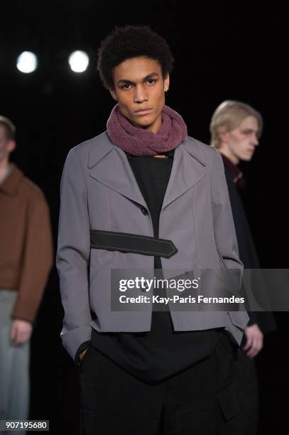 Model walks the runway during the Mackintosh 0003 Menswear Fall/Winter 2018-2019 show as part of Paris Fashion Week on January 19, 2018 in Paris,...