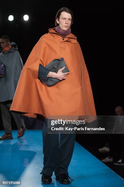 Model walks the runway during the Mackintosh 0003 Menswear Fall/Winter 2018-2019 show as part of Paris Fashion Week on January 19, 2018 in Paris,...