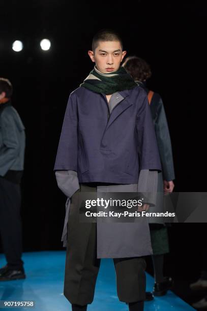 Model walks the runway during the Mackintosh 0003 Menswear Fall/Winter 2018-2019 show as part of Paris Fashion Week on January 19, 2018 in Paris,...