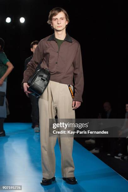 Model walks the runway during the Mackintosh 0003 Menswear Fall/Winter 2018-2019 show as part of Paris Fashion Week on January 19, 2018 in Paris,...