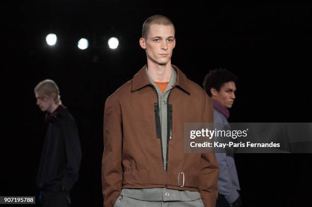 Model walks the runway during the Mackintosh 0003 Menswear Fall/Winter 2018-2019 show as part of Paris Fashion Week on January 19, 2018 in Paris,...