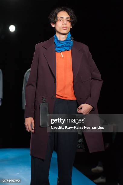 Model walks the runway during the Mackintosh 0003 Menswear Fall/Winter 2018-2019 show as part of Paris Fashion Week on January 19, 2018 in Paris,...