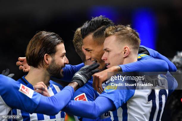 Davie Selke of Hertha Berlin celebrates with his team-mates after scoring his team's first goal to make it 1-0 during the Bundesliga match between...