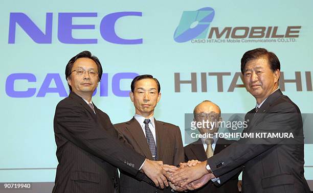 Casio Hitachi Mobile Communications president Takeki Oishi , NEC Corp. Executive director Akihito Otake , Casio Computer Co. Executive Akinori Takagi...