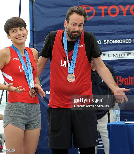 Jason Lee and Ceren Alkac attend the 23rd Annual Nautica Malibu Triathalon at Zuma Beach on September 13, 2009 in Malibu, California.