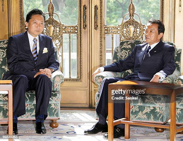 Democratic Party of Japan President and incoming Prime Minister Yukio Hatoyama and outgoing Prime Minister Taro Aso hold a meeting at the Diet...