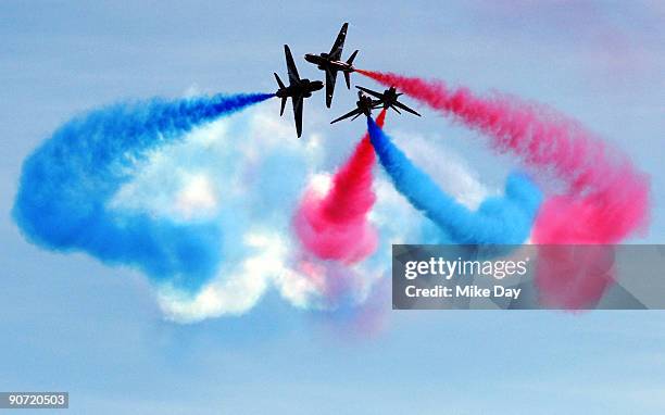 Flying 30 year old British Aerospace Hawk aircraft the Red Arrows perform during the RAF Leuchars Air Show on September 12, 2009 in St Andrews,...