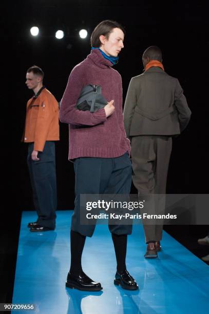 Model walks the runway during the Mackintosh 0003 Menswear Fall/Winter 2018-2019 show as part of Paris Fashion Week on January 19, 2018 in Paris,...