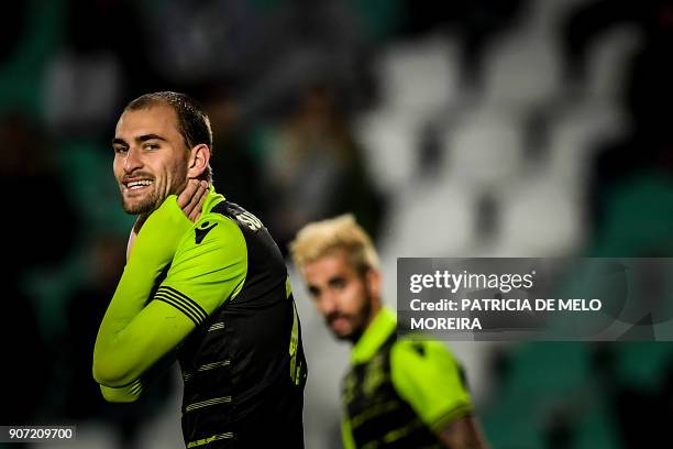 Sporting's Dutch forward Bas Dost gestures during the Portuguese league football match between Vitoria FC and Sporting CP at the Bonfim stadium in...