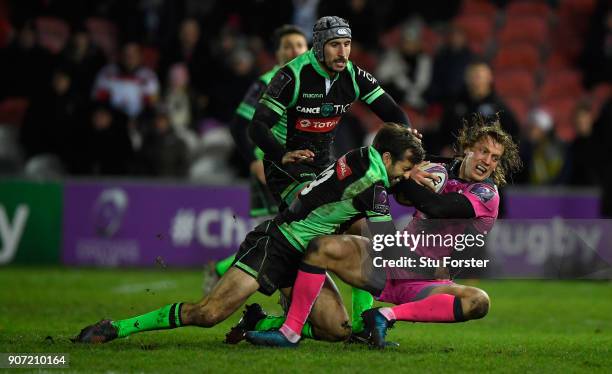 Billy Twelvetrees of Gloucester is hit hard by Conrad Smith of Paloise during the European Rugby Challenge Cup match between Gloucester and Section...
