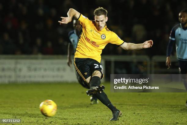 Mickey Demetriou of Newport County scores his sides second goal of the match from a penalty during the Sky Bet League Two match between Newport...