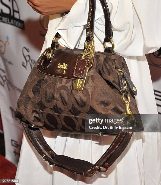 Close up of actress Rhyon Nicole Brown's handbag as she attends actress Kyla Pratt�s 23rd Birthday Bash at the Geisha House on September 6, 2009 in...